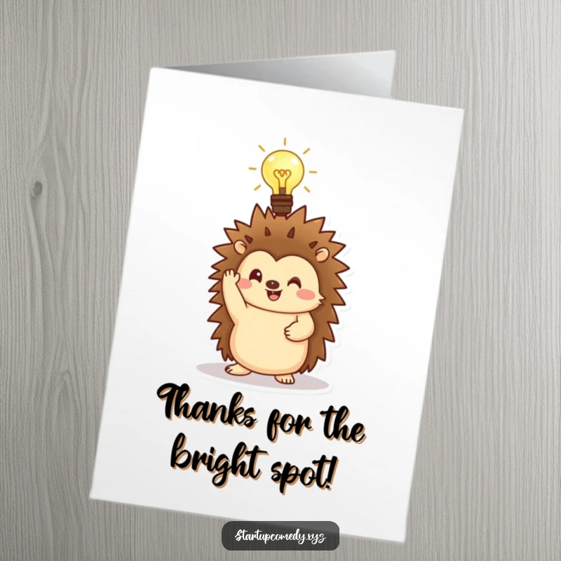 Funny Free Printable Thank You Card: Cheerful hedgehog with a glowing lightbulb, a bright symbol of thanks.