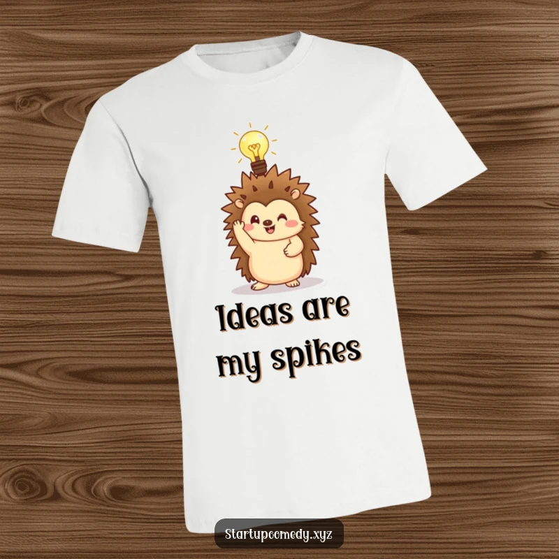 Funny Hedgehog T-Shirt featuring a cheerful character with a glowing lightbulb, sparking creativity.